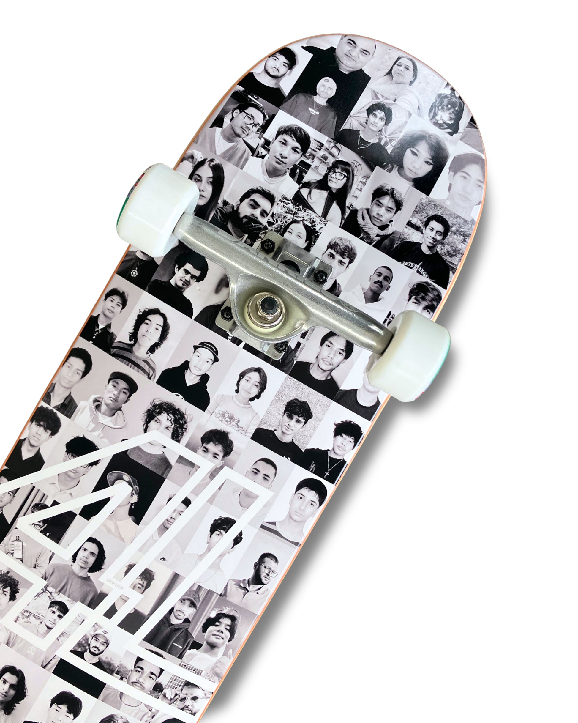 Dankies Class of 25' complete Skateboard with a collage of faces pattern on a white background - top