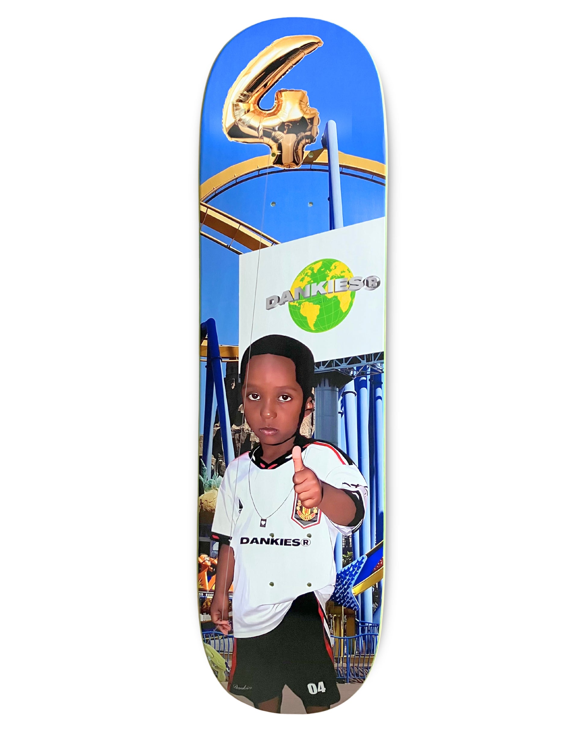 Dankies 4L Skateboard deck with 4th Anniversary Graphic that features a kid holding a Number 4 balloon in a theme park