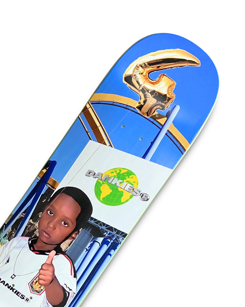 Dankies 4L Skateboard deck with 4th Anniversary Graphic that features a kid holding a Number 4 balloon in a theme park - top