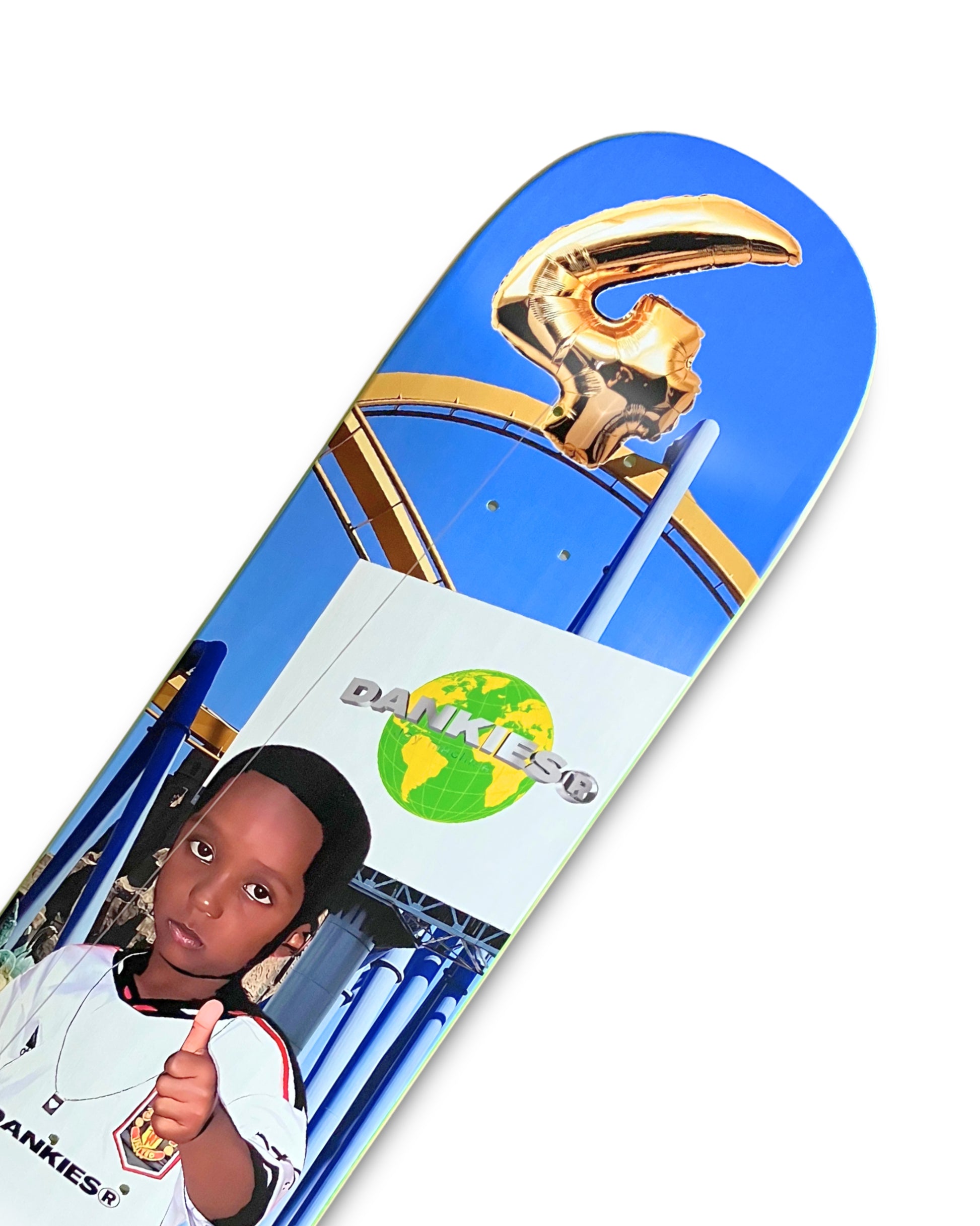 Dankies 4L Skateboard deck with 4th Anniversary Graphic that features a kid holding a Number 4 balloon in a theme park - top
