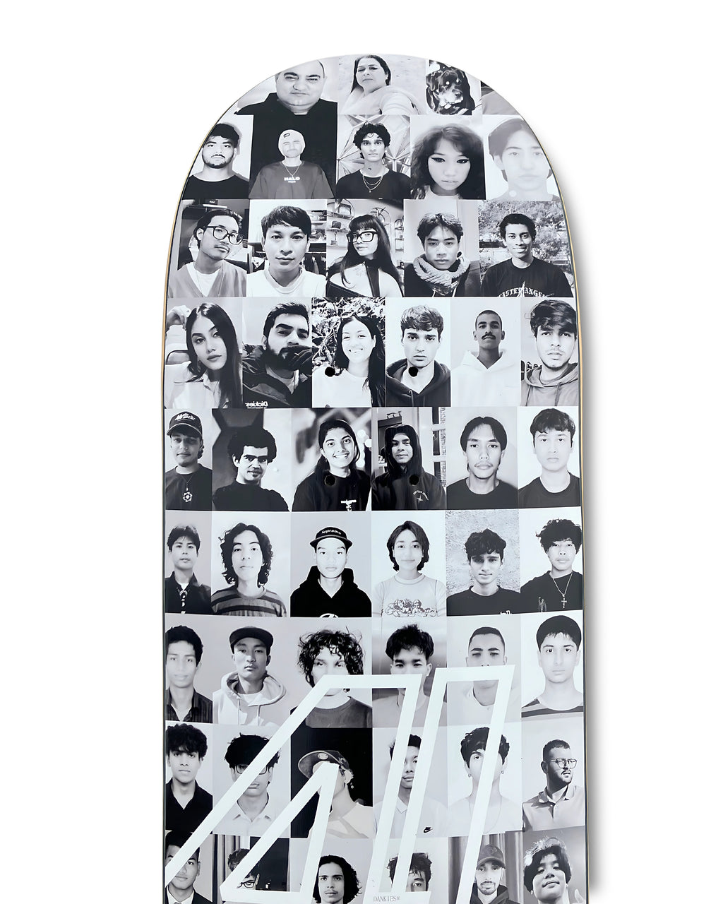 Dankies Class of 25' Skateboard deck with a collage of faces pattern on a white background - top