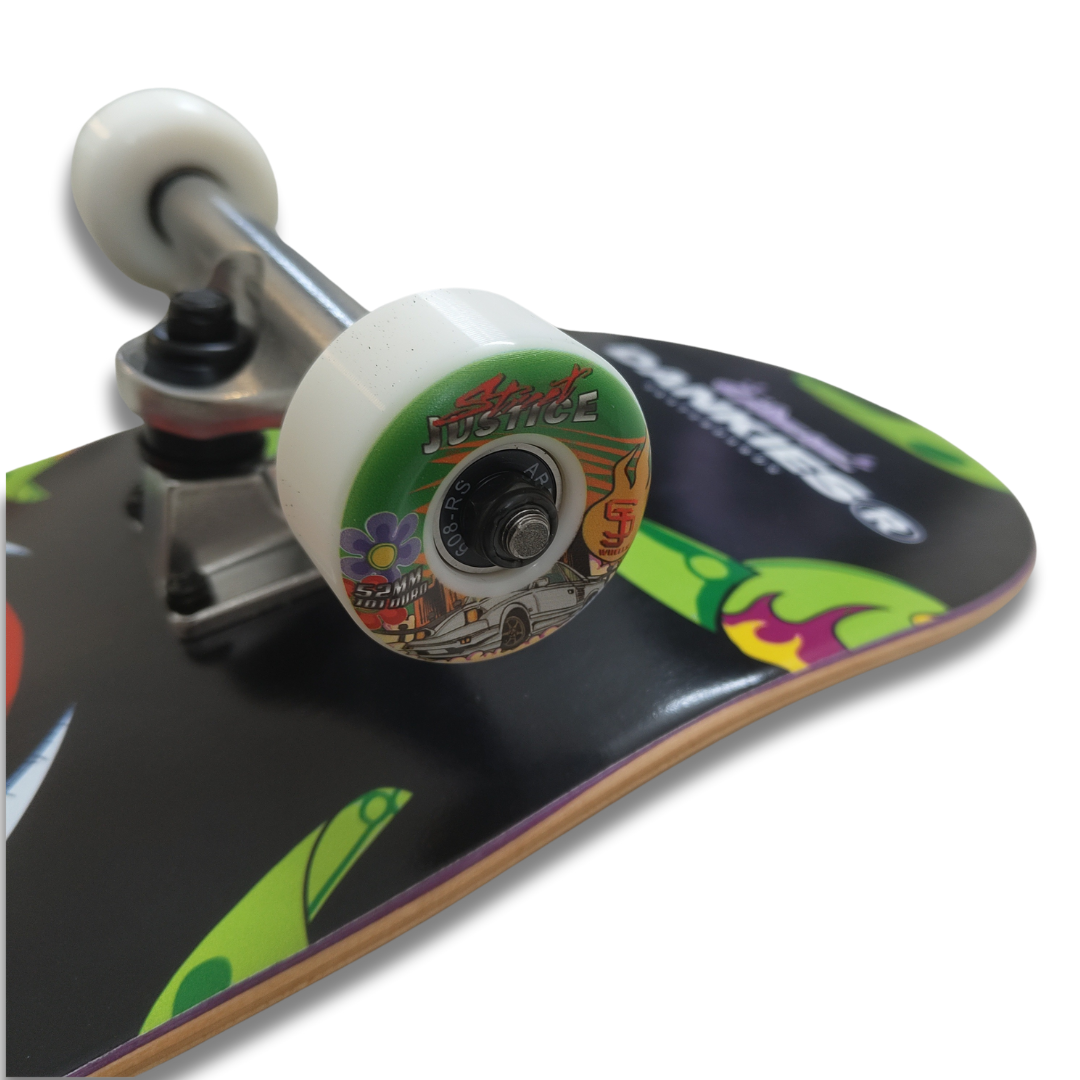 dankies crimson complete skateboard with a character illustration on the deck, including red and black tones with yellow and green accents. - tilted angle from top